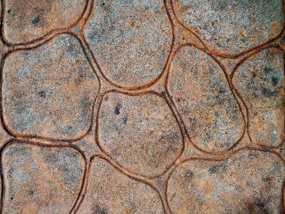 How Weather Exposure Impacts Residential Stamped Concrete Surfaces